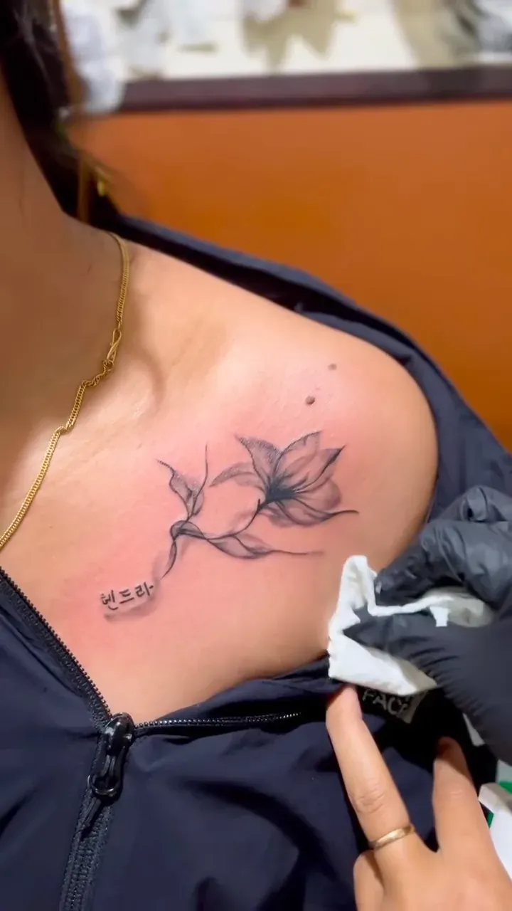 Fine line botanical stem with small lettering, freshly finished