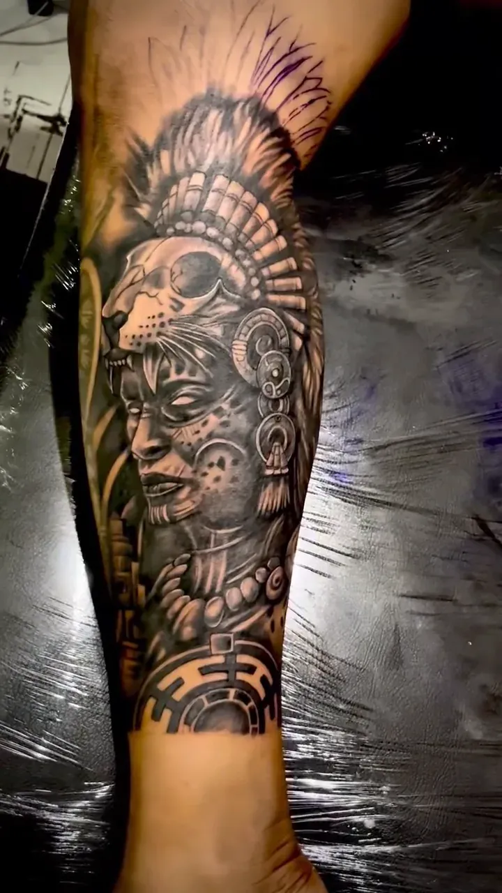 Black and grey warrior portrait with an elaborate feather headdress